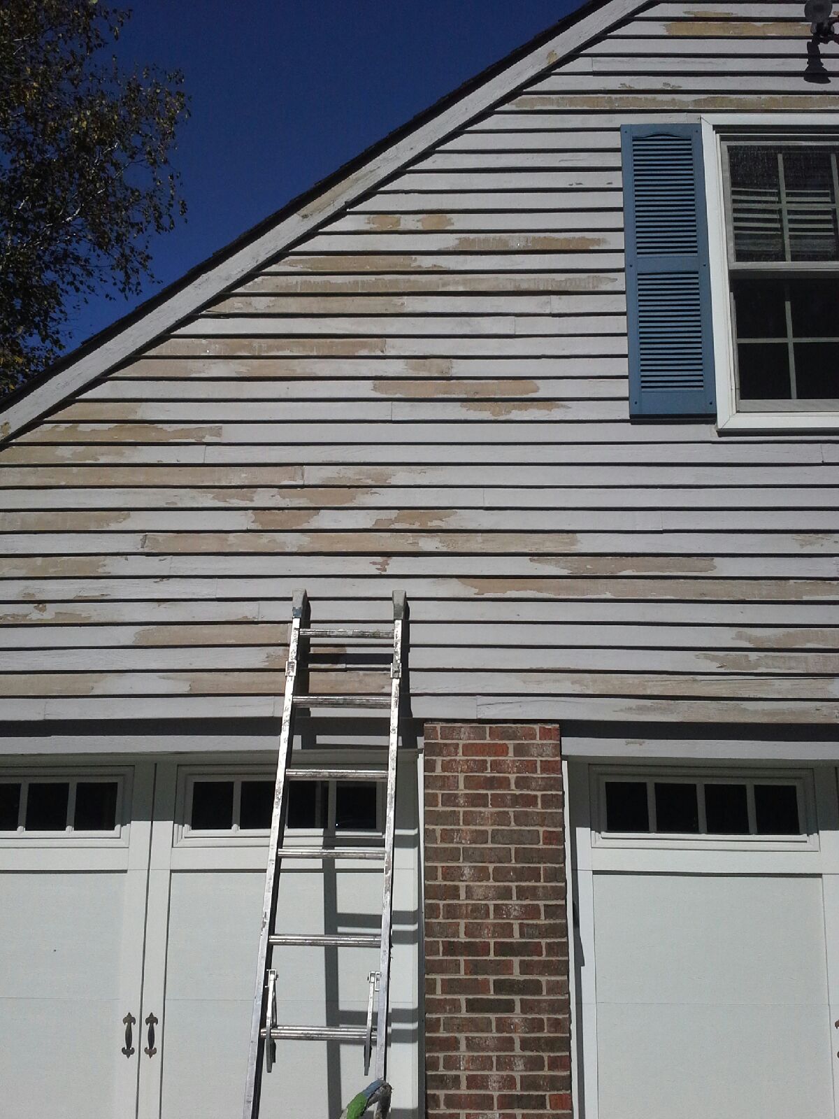Peeling Solid Color Stain on Cedar Siding? Painting In